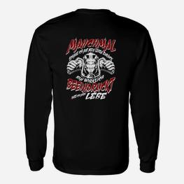 Schwarzes Langarmshirts Manchmal muss es rockig sein mit Faustmotiv, Rocker-Stil - Seseable