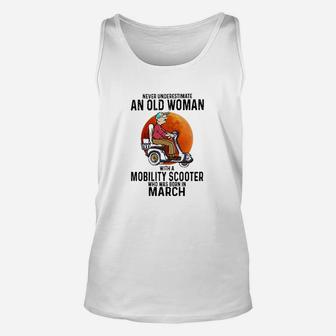 Never Underestimate A Old Woman With A Mobility Scooter Who Was Born In March Unisex Tank Top - Seseable