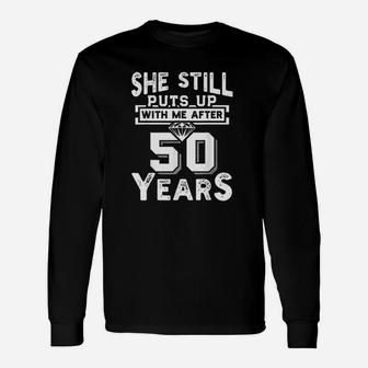 She Still Puts Up With Me After 50 Years Wedding Anniversary Long Sleeve T-Shirt - Seseable