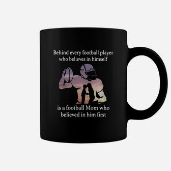 Behind Every Football Player Who Believes In Himself Is A Football Mom Who Believed In Him First Coffee Mug - Seseable