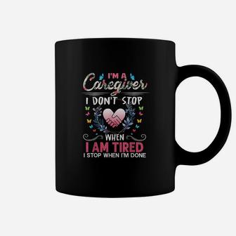 Im A Caregiver I Dont Stop When I Am Tired Funny Coffee Mug - Seseable