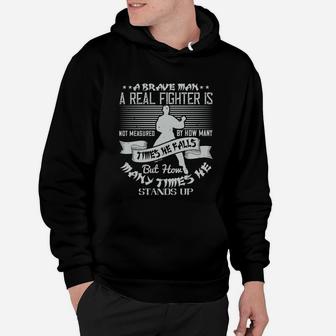 A Brave Man A Real Fighter Is Not Measured By How Many Times He Falls But How Many Times He Stands Up Hoodie - Seseable