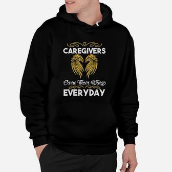 Caregivers Earn Their Wings Everyday Funny Caregivers Hoodie - Seseable
