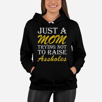 Just A Mom Trying Not To Raise Women Hoodie - Seseable