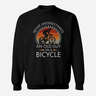 An Old Guy On A Bicycle Cycling Vintage Never Underestimate Sweat Shirt - Seseable