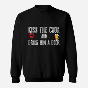Funny Cook Kiss The Cook And Bring Him A Beer Sweat Shirt - Seseable