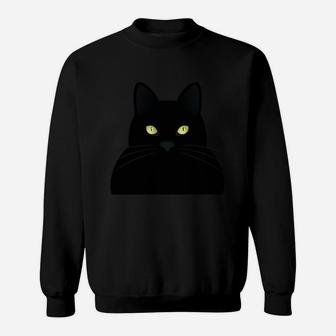 Schwarzes Sweatshirt mit Katzengesicht, Leuchtende Augen Design - Seseable