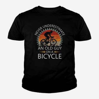 An Old Guy On A Bicycle Cycling Vintage Never Underestimate Kid T-Shirt - Seseable