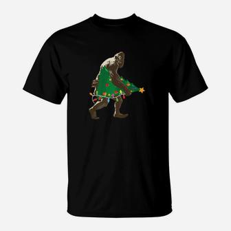 Bigfoot Carrying Christmas Tree Holiday Season T-Shirt - Seseable