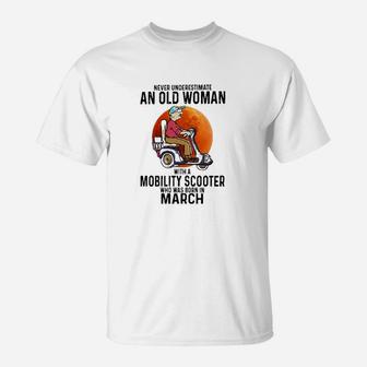 Never Underestimate A Old Woman With A Mobility Scooter Who Was Born In March T-Shirt - Seseable