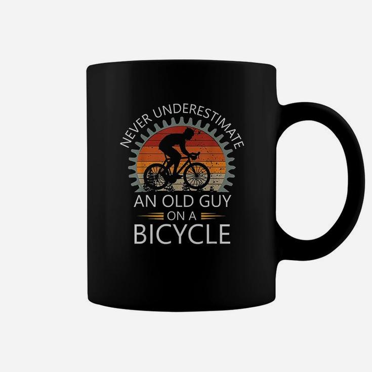 An Old Guy On A Bicycle Cycling Vintage Never Underestimate Coffee Mug
