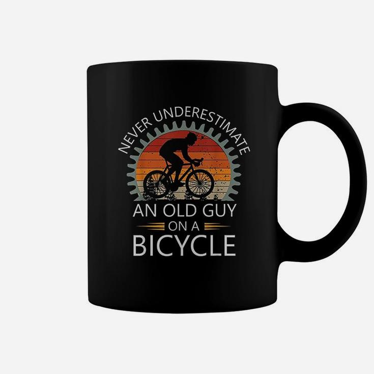 An Old Guy On A Bicycle Cycling Vintage Never Underestimate Coffee Mug