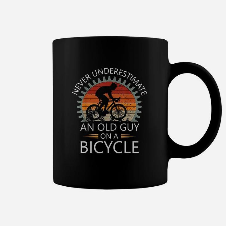 An Old Guy On A Bicycle Cycling Vintage Never Underestimate Coffee Mug