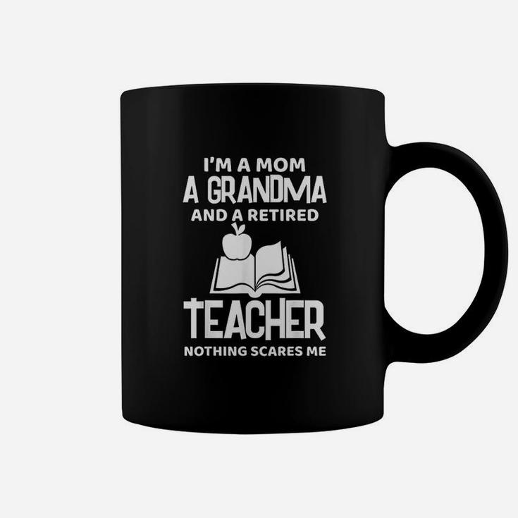 I Am A Mom A Grandma And A Retired Teacher Nothing Scares Me Coffee Mug
