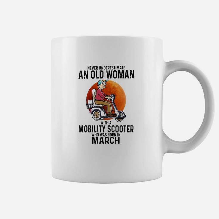 Never Underestimate A Old Woman With A Mobility Scooter Who Was Born In March Coffee Mug