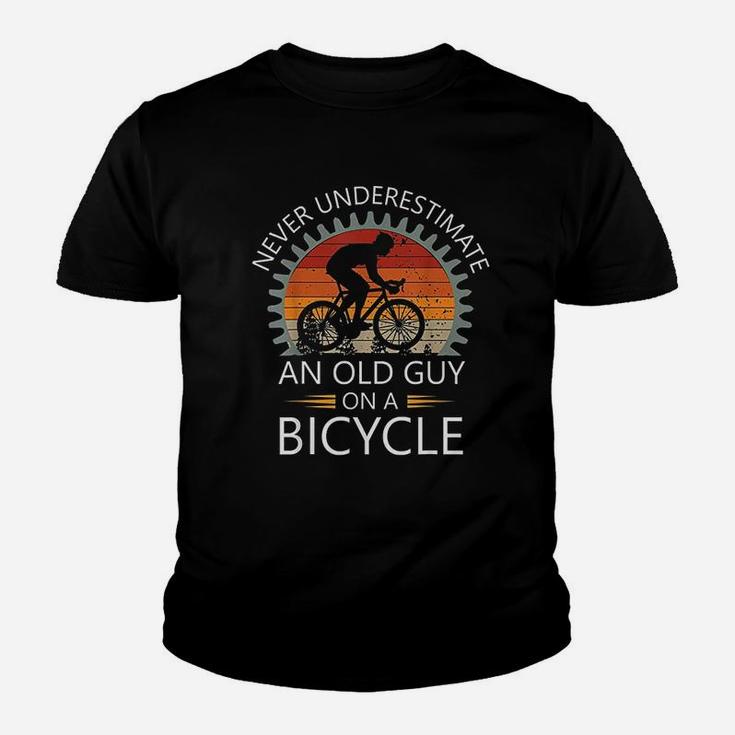 An Old Guy On A Bicycle Cycling Vintage Never Underestimate Kid T-Shirt