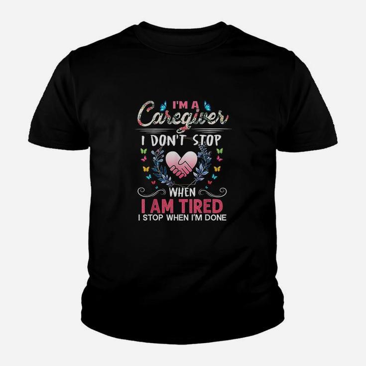 Im A Caregiver I Dont Stop When I Am Tired Funny Kid T-Shirt