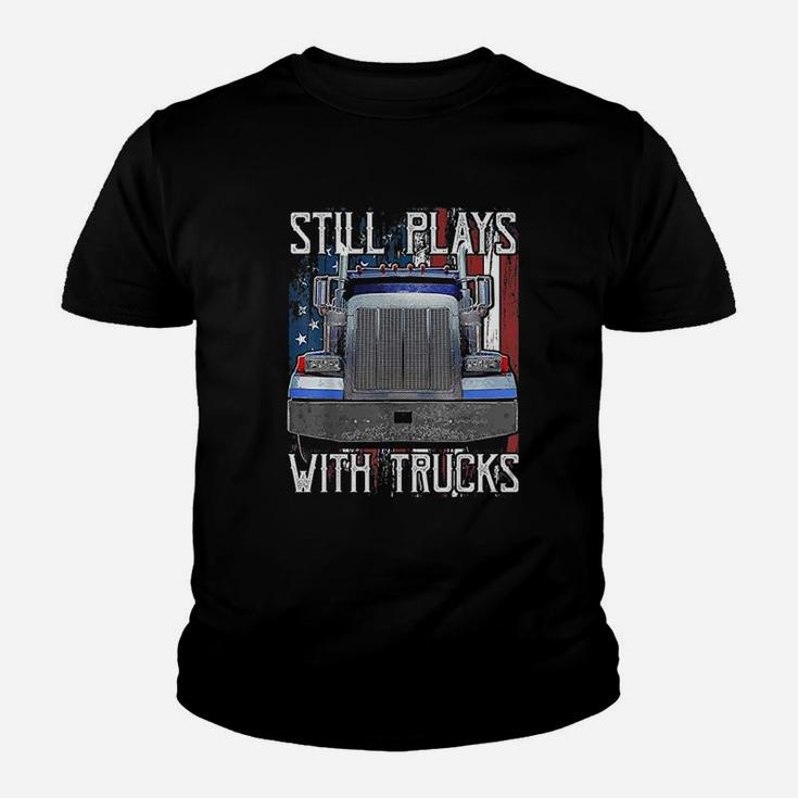Still Plays With Trucks Funny Truck Driver American Flag Kid T-Shirt